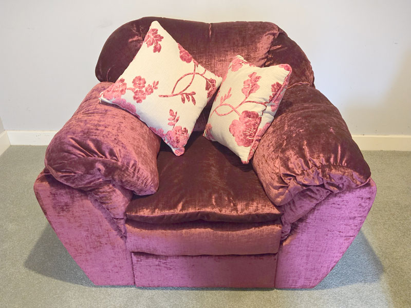 New Ercol dining chair cushions showing the webbing and stud fastenings